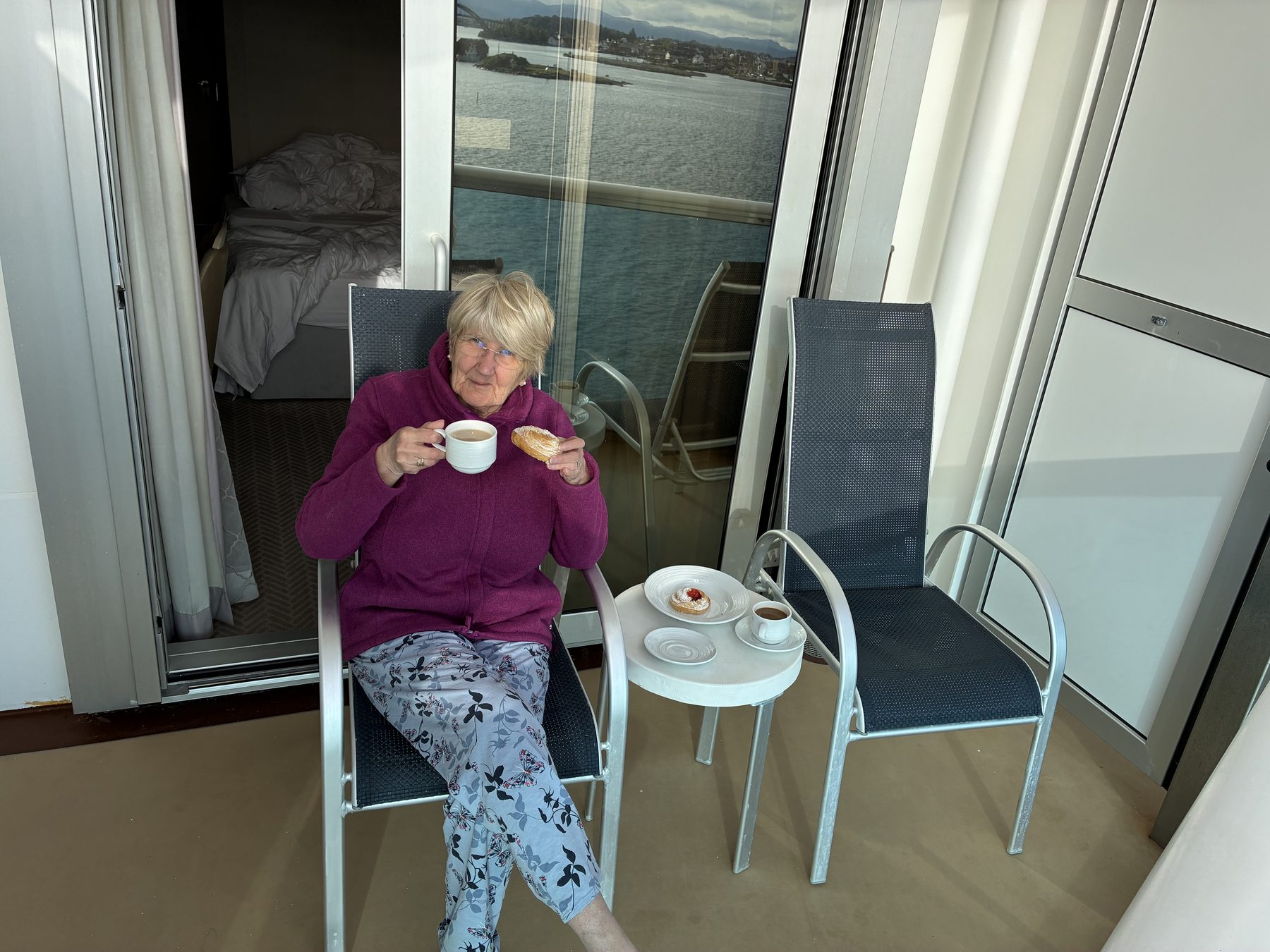 Frances on the balcony with coffee