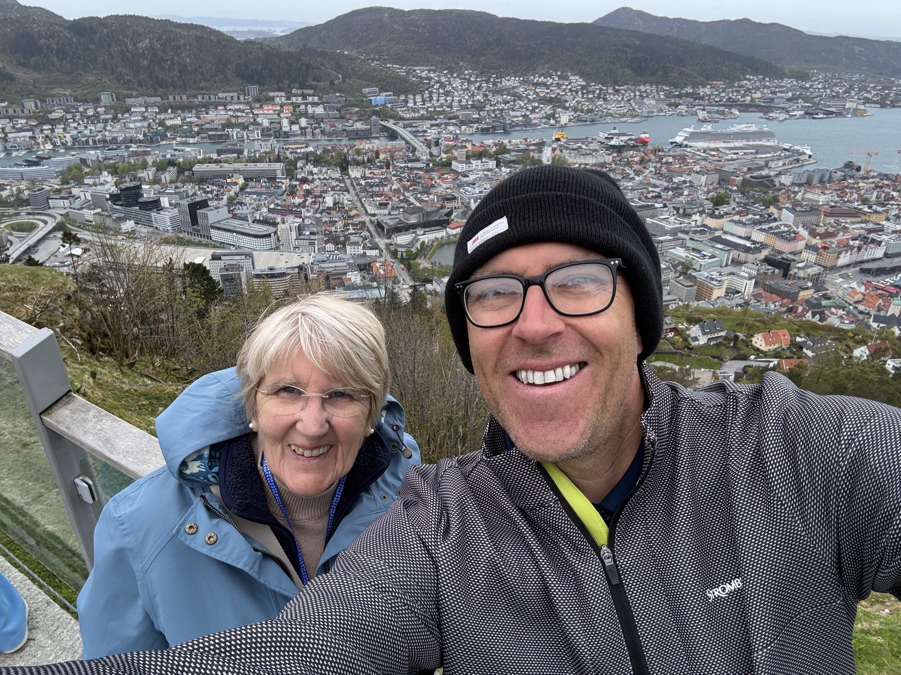Mount Fløyen summit selfie with Bergen below